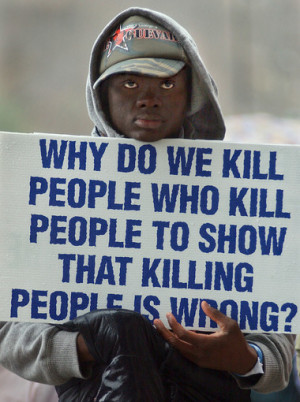 Irony:A 2004 protester at the coming execution (carried out 2005) of ...