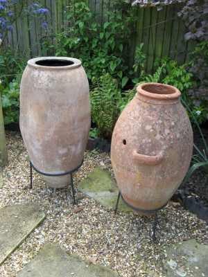 Large terracotta olive oil garden urn with one handle. Comes with ...