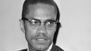 Malcolm X, African-American black muslim leader, is shown at JFK ...