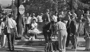 Elizabeth Eckford sitting at the bus stop to travel back to her ...