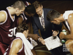 Basketball Team in a Huddle Photographic Print