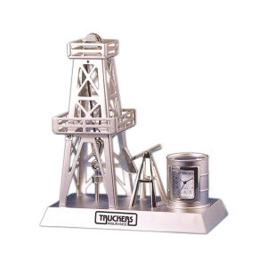 miniature oil derrick on a base with a clock miniature oil derrick ...