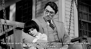 ... (Gregory Peck) talking to Scout (Mary Badham) on their porch swing