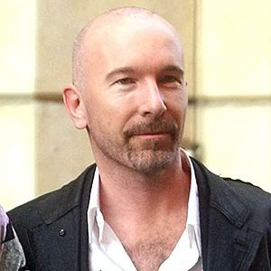 Charlie's not afraid of showing his bald spot - The Edge is wearing ...