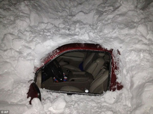 Buried: The Higgins family's SUV was smothered under a snowdrift on ...