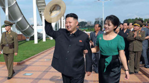 North Korean leader Kim Jong Un, accompanied by his wife, Ri Sol Ju ...