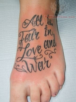 Foreign Language Lettering Tattoo