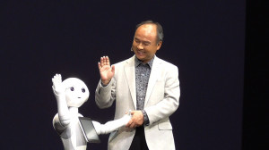 Softbank CEO Son Masayoshi with Pepper the Japanese robot who can
