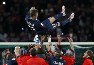 ... him in the air after his last game as a professional soccer player