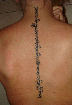 Tibetan calligraphy tattoo