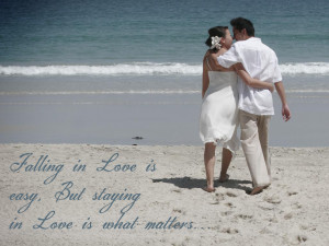 This beautiful love quote is written on the sandy beach. Also next to ...