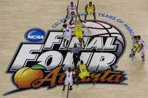 Michigan and Louisville play during the first half of the NCAA Final ...