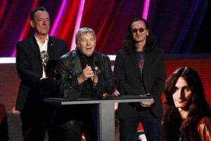 , left, and Geddy Lee of Rush during their induction at the 2013 Rock ...