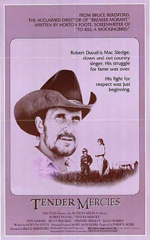 movie poster with a large picture of a bearded man wearing a cowboy ...