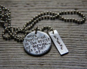 Hand-stamped quote from the Baha'i writings, 