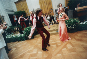 Susan Ford dancing in the East Room with the band's lead singer during ...