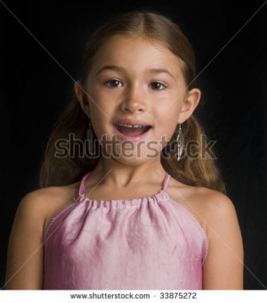 cute mixed race girl with mouth open in wonder and delight stock photo
