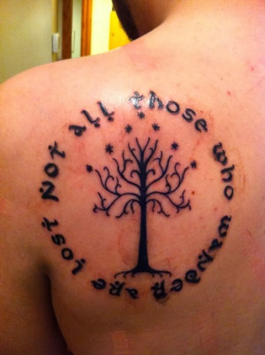 quotes-lord-of-the-rings-tattoo-design-for-men-on-upper-back.jpg