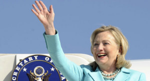 Hillary Rodham Clinton waves as the arrives at Lusaka International ...