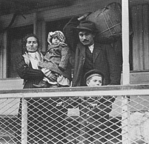 Family waiting to land at Ellis Island.