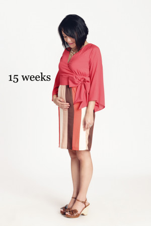 View Mai's maternity-friendly outfit: necklace , dress , shoes .