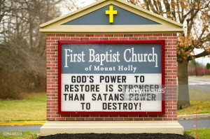 News Photo : Church sign with quote 'God's Power to Restore is...