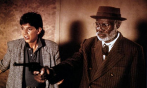... Willie Brown waves a gun in the motion picture Crossroads (1986