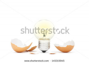 Bright Ideas Light Bulb Hatching From Egg Shell - stock photo