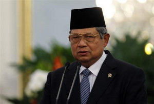 Susilo Bambang Yudhoyono speaks beside Dutch Prime Minister Mark Rutte ...
