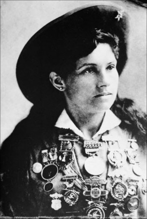 Annie Oakley, American sharpshooter and performer, is shown with a ...