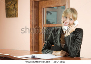 Cute Blond Woman Front Desk
