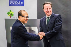 Pictured above with David Cameron (R), Li Ka-shing is one of Asia's ...