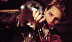 Pictured above: Tom Cruise, as the Vampire Lestat drains a rat's blood ...