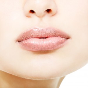 WOMAN-GLUES-LIPS-SHUT-facebook.jpg