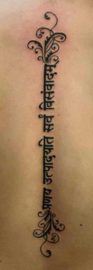 Sanskrit spine tattoo idea