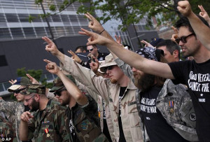 Protest: U.S. war veterans flash the peace sign before throwing their ...