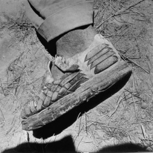 publicbeware.comClose Up of Worn Out Shoes Being Worn by Mexicans Who ...