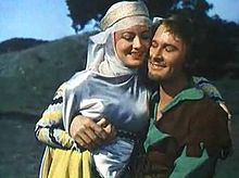 Olivia de Havilland as Lady Marian and Errol Flynn as Robin Hood.