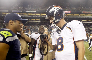 ; Seattle Seahawks quarterback Russell Wilson (3) and Denver Broncos ...