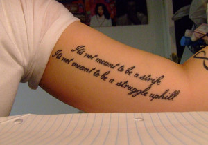 Dreadful Quote Tattoo On Inner Bicep