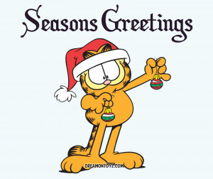 ... - Garfield wearing a Santa hat and holding Christmas ornaments