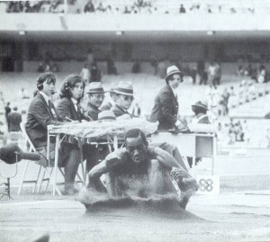 Bob Beamon sets long jump record in 1968