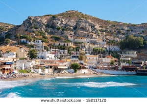 Boats At Sunrise In Matala Beach Crete Island Greece Stock Photo