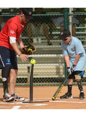 Wounded Veterans Teach Young Amputees About Softball and Courage