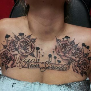 Flowers and quote chest piece tattoo by WitchHammerTattoo