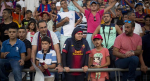 Israeli Jews and Arabs watch, together, as FC Barcelona plays in ...