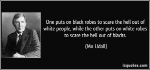 One puts on black robes to scare the hell out of white people, while ...