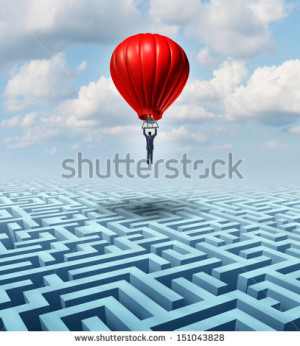 flying and soaring over a complicated maze in a hot air balloon ...