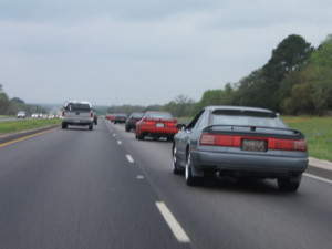 This is our incredible line of cars heading to the drag racing action ...