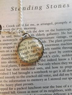 Outlander by Diana Gabaldon...necklace made from page of book! I want ...